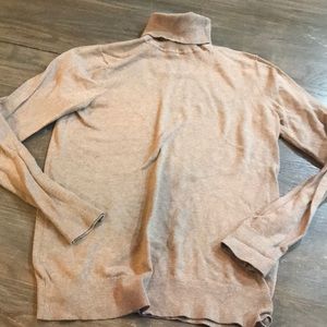 Woman’s fitted turtleneck